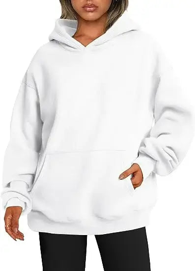 Womens hoodies with pockets big in white, featuring an oversized fit and cozy design.