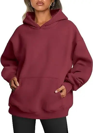 Womens hoodies with pockets big, featuring a stylish oversized fit in a burgundy color.
