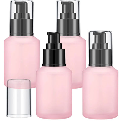 4 Pcs Empty Refillable Pink Frosted Glass bottles with pump caps for skincare and travel.